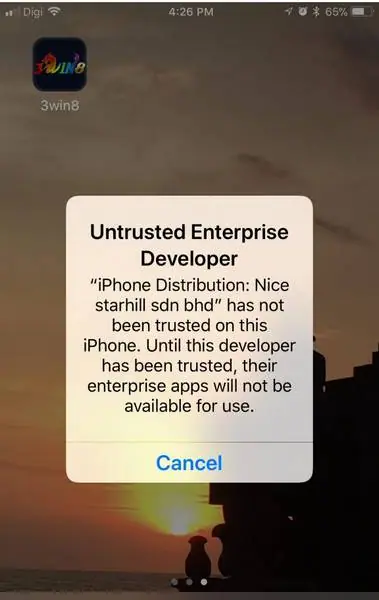 Untrusted Enterprise Developer warning naming the iPhone Distribution company, with a Cancel button