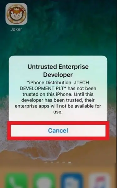 Untrusted Enterprise Developer warning over the home screen with the Joker icon and Cancel highlighted