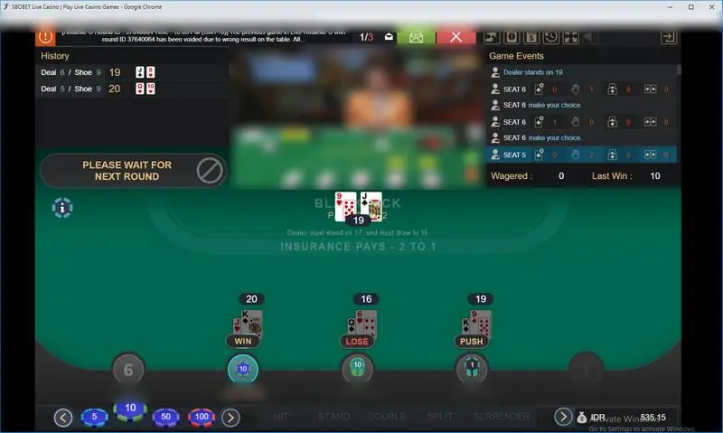 Round result with seats marked Win, Lose and Push against a dealer total of 19
